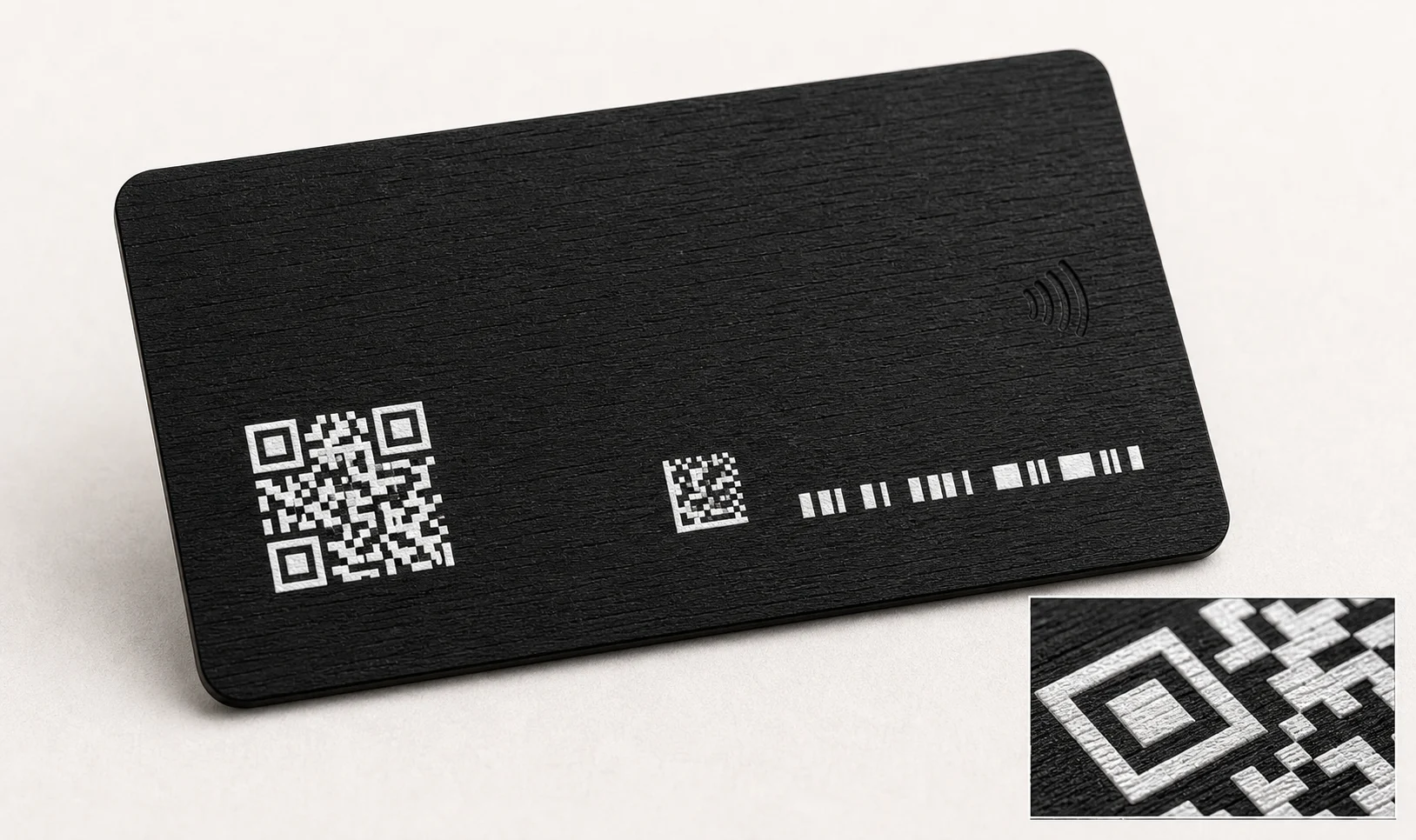 Black wood RFID card with white QR and serial data